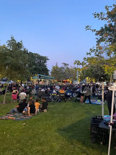 Picnic blankets and camp chairs across the lawn as the crowd settles in for the live music